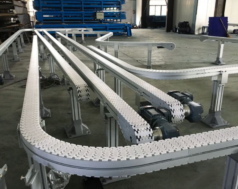 Hệ thống xích và tấm băng của băng tải xích tấm