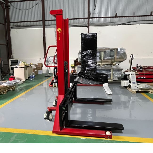 Manual pull lift truck transporting construction materials